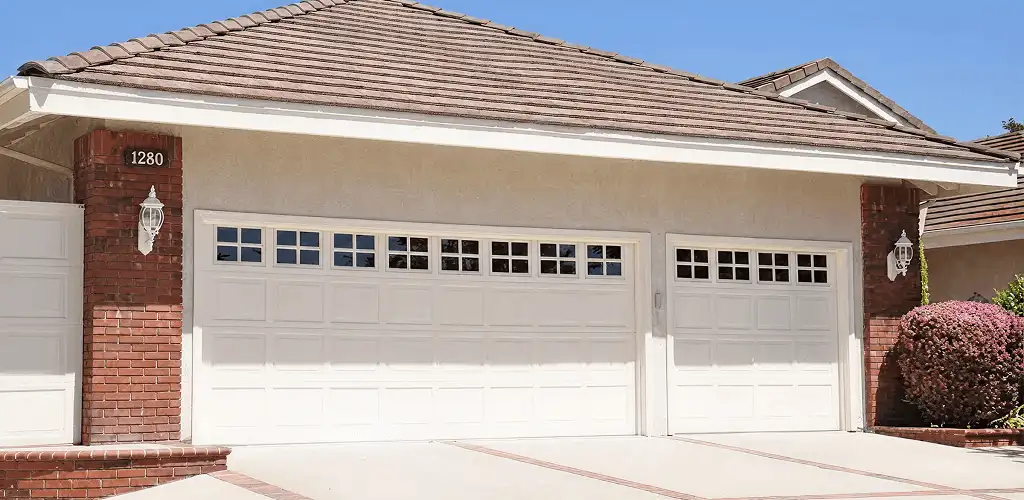 Residential garage door repair service for a double garage door in Hollywood, FL